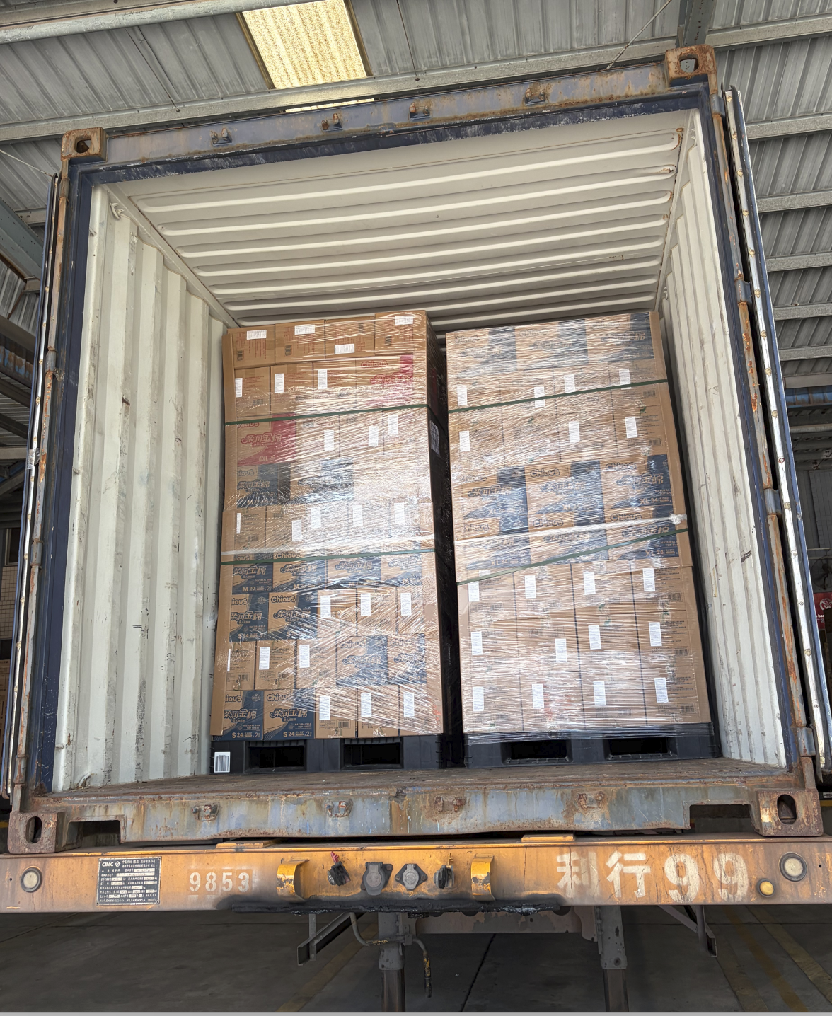 Photo of Chiaus Containers Being Loaded for Export to Canada