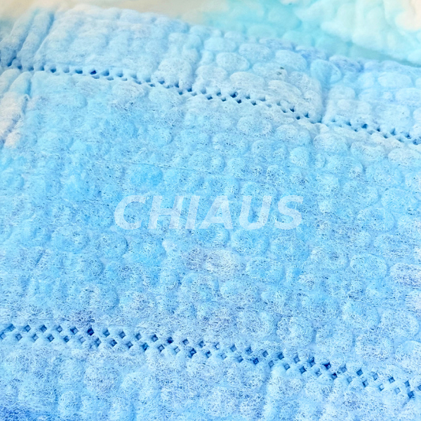 Absorbent core of rectangular incontinence pad after liquid absorption