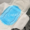 Blue Liquid Absorption Demonstration on a Sanitary Pad Absorbent Core 