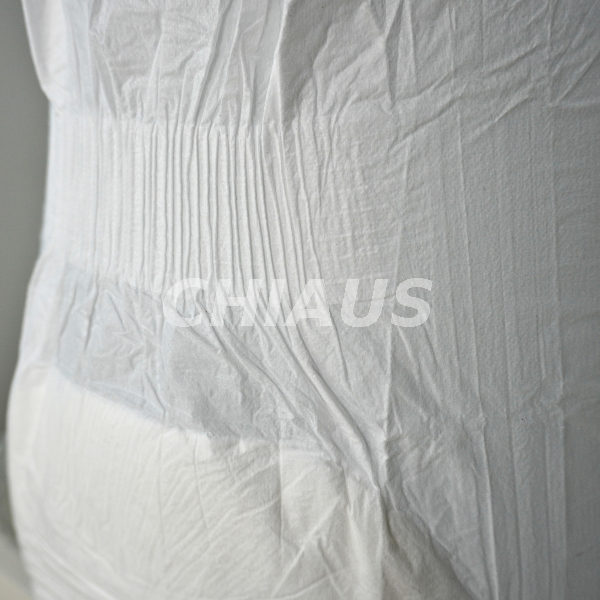 Extended elastic side panels and overlapping hook-and-loop fastening system