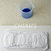 Rectangular incontinence pad with absorbency test cup
