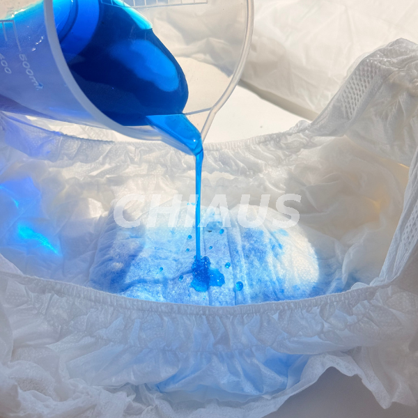 Blue liquid absorption test on adult brief absorbent core